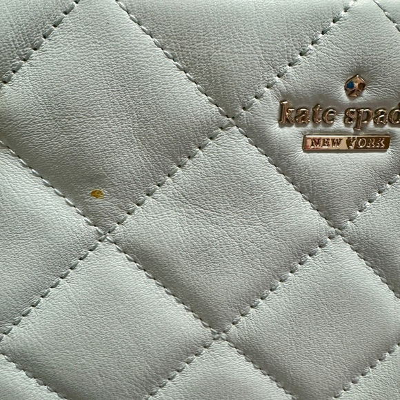 Brand New. Kate Spade light blue tote with gold chain...